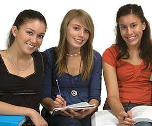 Three female students pose together
